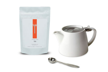 Teapot, tea spoon & one bag of loose-leaf tea